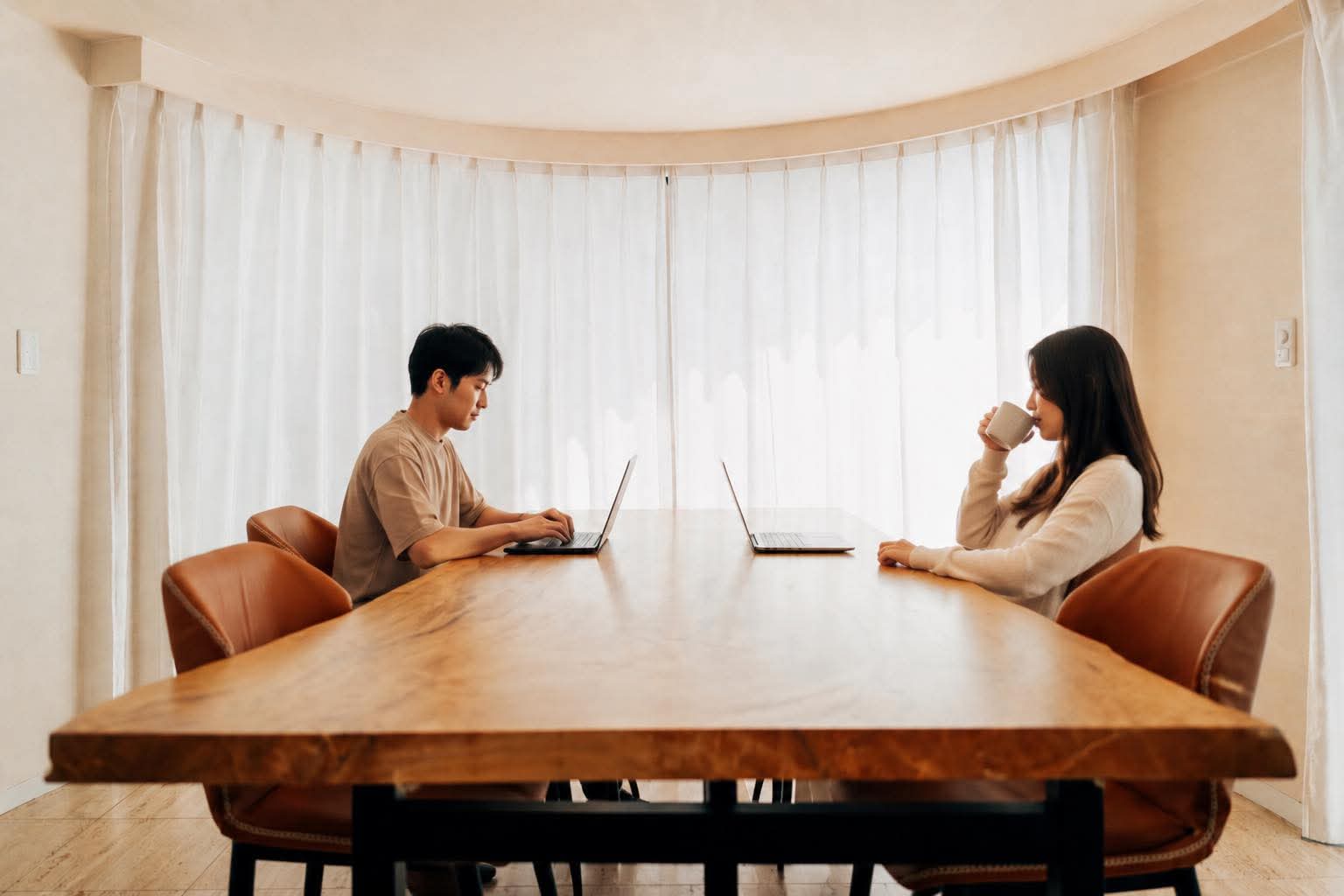 Two guests sharing the dining table at One Shibuya Hill